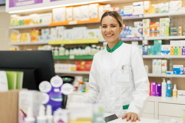 istock Young woman pharmacist at her workplace 2166849294