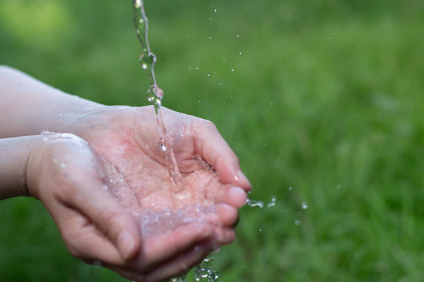 Pose of receiving water with palms