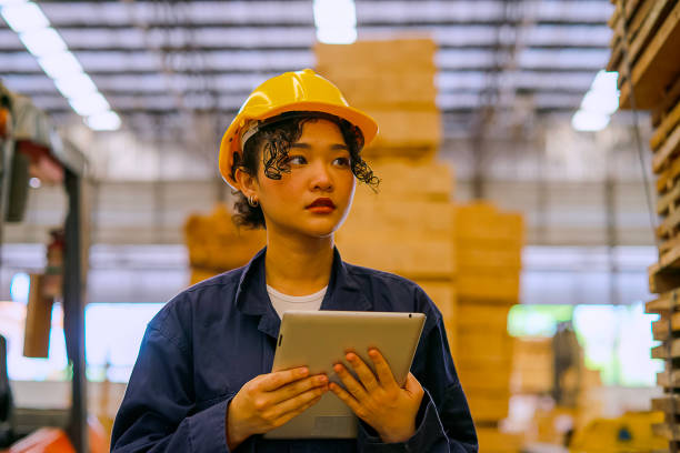 istock Blue collar worker is working at wood factory. 2166853135