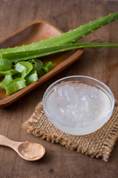istock Aloe vera on wooden background 2166855371