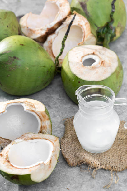istock Coconut water on cement background 2166855531