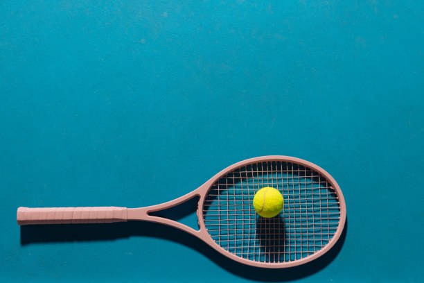 istock Tennis racquet on a blue surface background 2166856997