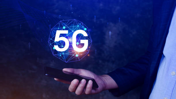 istock Business using smartphone with holographic 5G network concept, digital globe with interconnected 5G symbols, 5G technology in modern business and communication, digital transformation 2166858299