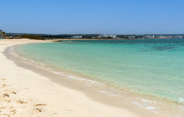 istock Empty sandy tropical beach. Golden sand, clear sky 2166861500