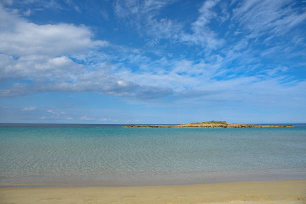 Empty sandy tropical exotic beach with with golden sand. Fig tree bay beach Cyprus