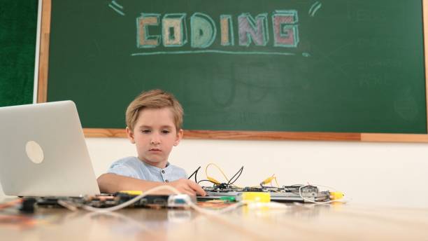 istock Caucasian student working on electronic board while sitting at class. Pedagogy. 2166862599