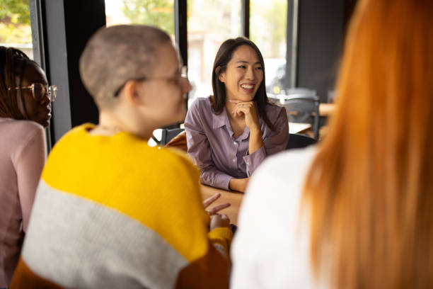 istock Group of friends talking in a pub 2166863246