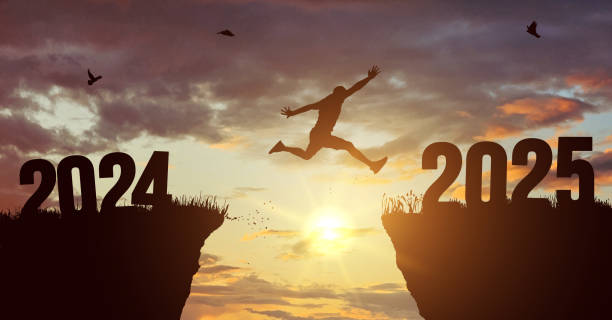 istock A young man jump between 2024 and 2025 years. Concept vector illustration over the sun and through on the gap of hill silhouette evening colorful sky. Vector illustration. Welcome Happy new year 2025. 2166865859