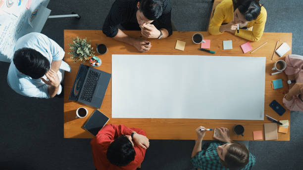 istock Top view of group walking at boardroom and brainstorming idea. Convocation. 2166868619