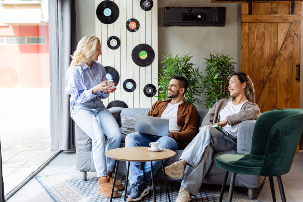 istock Casual meeting in modern co-working space with relaxed atmosphere 2166869126