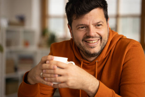 istock Man relaxing at home 2166869261