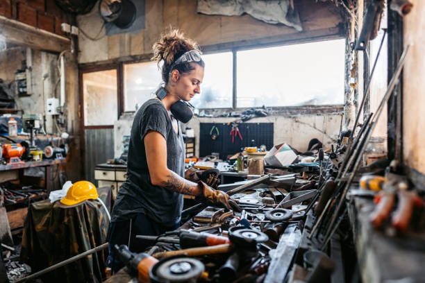 istock Young Woman Working With Metal In A Metal Workshop 2166870141