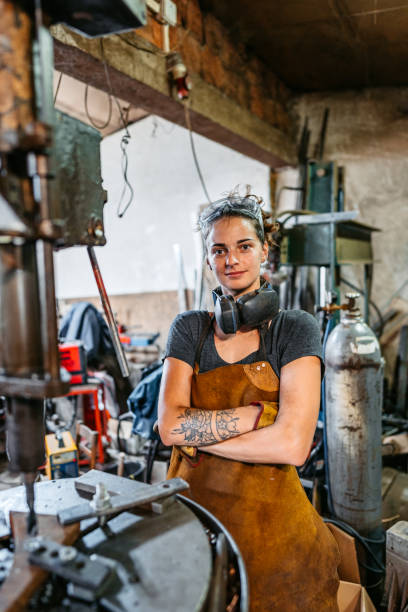 istock Young Female Welder In A Metal Workshop 2166870142