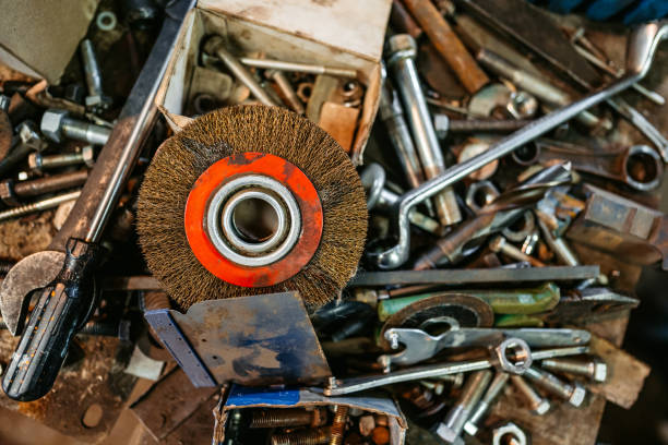 A variety of metalworking tools fill the busy workshop.
