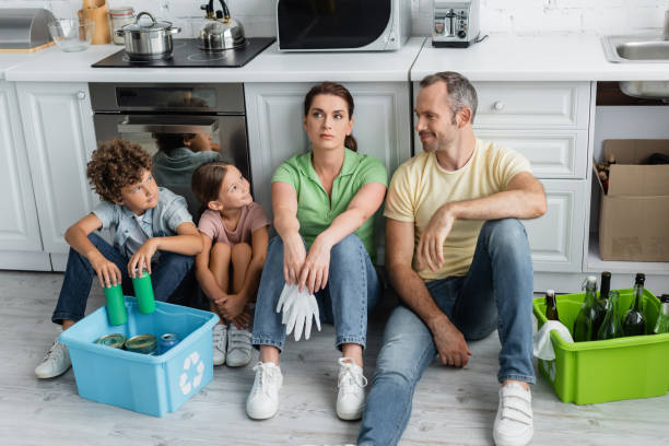 istock A big loving family practicing zero waste recycling in their modern kitchen 2166872260