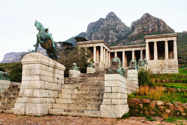 Rhodes Memorial, the Cape Town monument to the controversial colonialist Cecil John Rhodes (1853-1902). The monument was designed by the celebrated architect Sir Herbert Baker (1862-1946). The equestrian statue named Energy was created by the sculptor George Frederic Watts 1817-1904) and the lions by John Macallan Swan (1846-1910). The monument, which lies on the slopes of Devil's Peak, adjacent to Table Mountain, was completed in 1912.