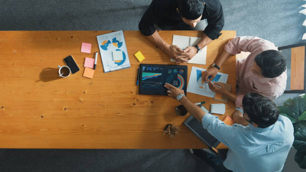 istock Smart manager explain financial graph to colleague at meeting room. Convocation. 2166875097