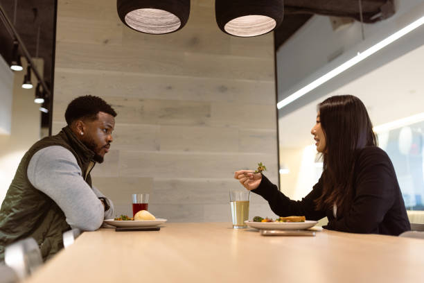 istock Lunch Meeting Discussion in Modern Cafe 2166876796