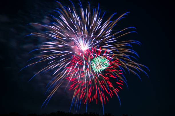 istock Colorful fireworks display against a dark night sky 2166881542