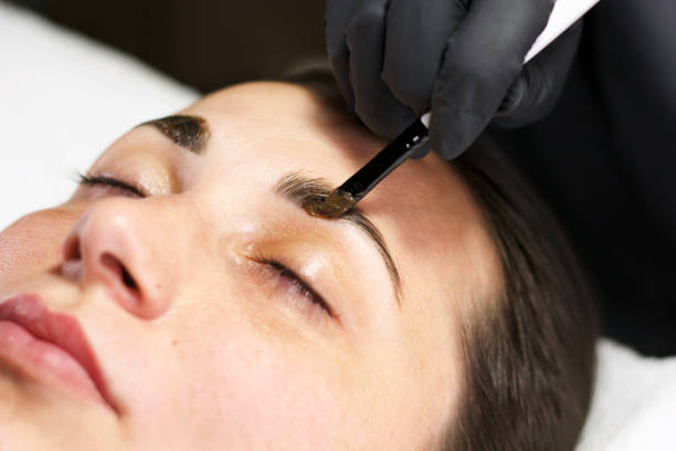 istock Professional Eyebrow Tinting Procedure in Beauty Salon 2166881867