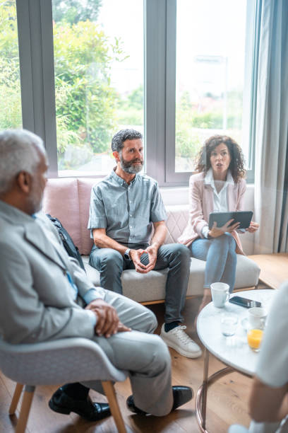 istock Diverse Group of Professionals Engaged in a Team Meeting 2166883372