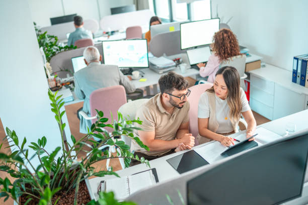 istock Diverse Team Engages in Project Collaboration in Modern Office 2166883754