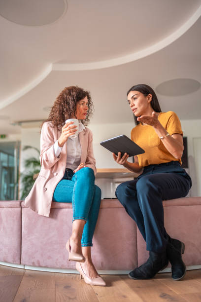 Diverse Female Professionals Collaborating in Modern Office