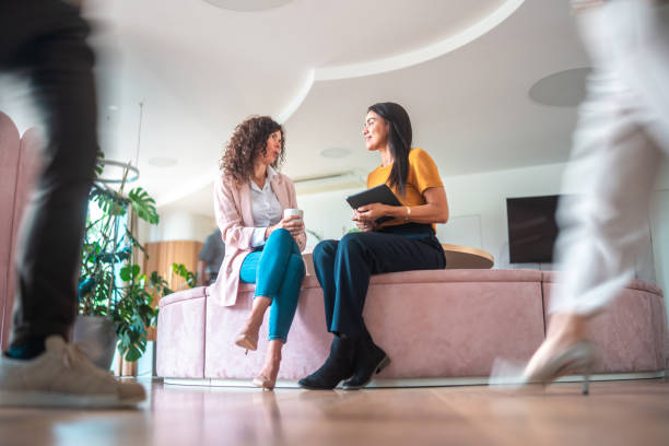 istock Caucasian and Hispanic Female Professionals in Collaborative Office Environment 2166883793