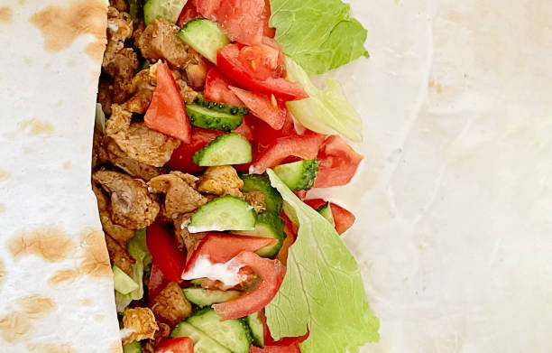 istock Delicious chicken shawarma with white background, flat lay, top view, copy space 2166885687