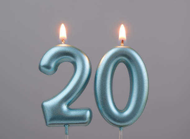 istock Blue birthday candles on gray background, number 20 2166889291