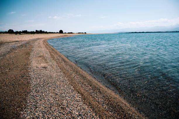 Coastline of salt lake in summer. Lake Issyk-Kul, Kyrgyzstan