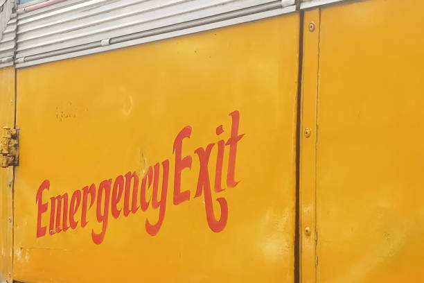 istock Emergency exit written in red on a bus, to indicate the emergency exit door. Kolkata, West Bengal, India. 2166891315