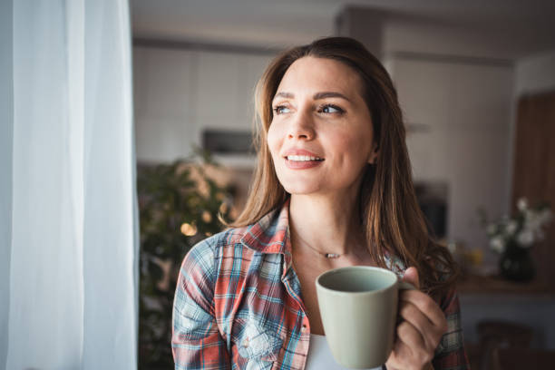 istock Young woman enjoying a quiet morning at home 2166892425