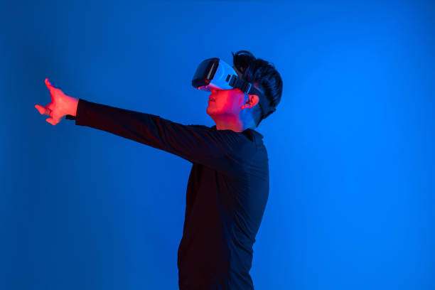 istock Smart sportman player wearing VR stretching whole body posing. Contrivance. 2166893714