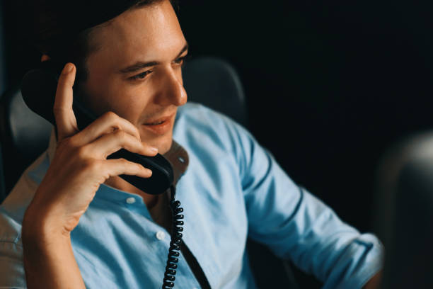 istock Businessman calling with telephone office consulting business data. Pecuniary. 2166897290