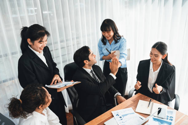 istock Diverse race office worker celebrate after made progress. Habiliment 2166898076