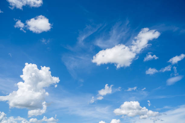 istock clouds and blue sunny sky,  white clouds over blue sky, Aerial view,  nature blue sky white cleat weather. 2166898424