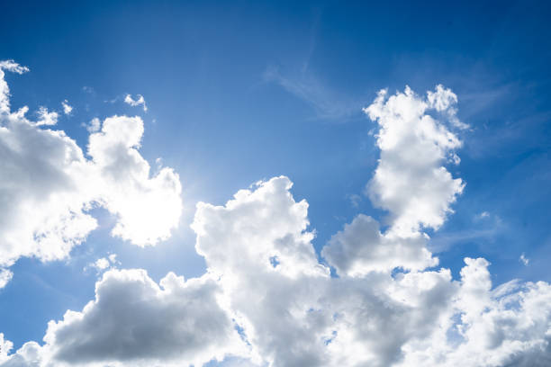 istock clouds and blue sunny sky,  white clouds over blue sky, Aerial view,  nature blue sky white cleat weather. 2166899018