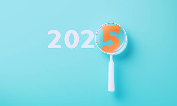 istock Colorful Magnifiers Over Orange 2025 On Blue Background 2166899124