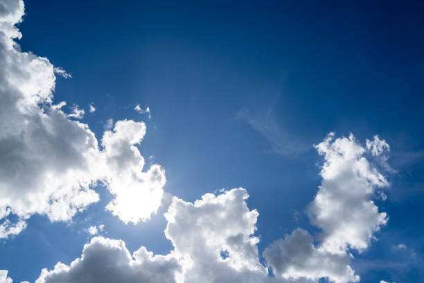 istock clouds and blue sunny sky,  white clouds over blue sky, Aerial view,  nature blue sky white cleat weather. 2166899218