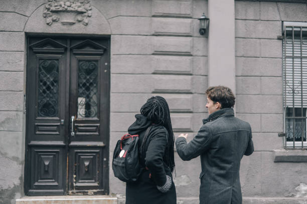 istock Urban Morning Conversation Outside Historic Building 2166899843