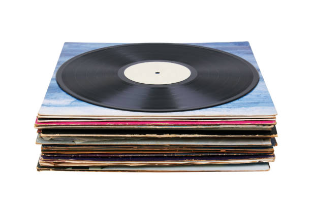 istock Vinyl record on a stack paper envelopes. Analog sound. Classic audio. Isolated on white 2166899991