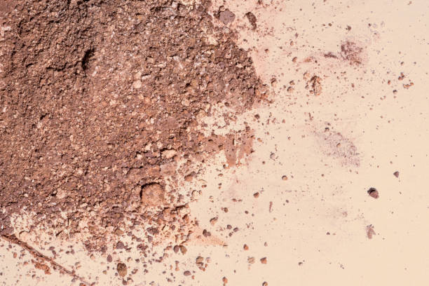 istock Crushed face powder bronzer, powder isolated on beige background, space for text, cosmetics swatch texture 2166900723