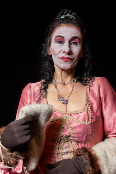 Latin actress playing as a high class woman with extremly comic make up