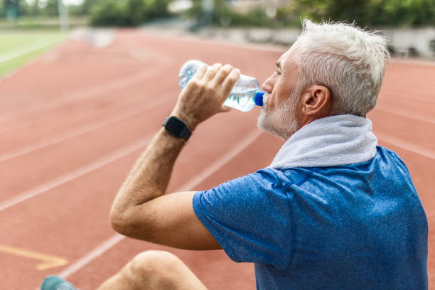 istock Senior Man Resting and Drinking Water 2166907422