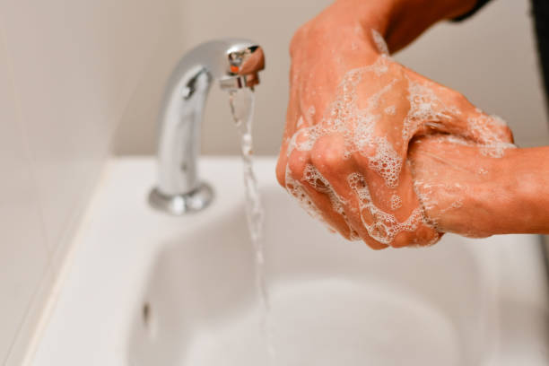 istock Woman soaping her hands 2166909948