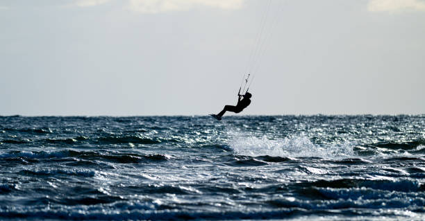 istock Kite surfing in a windy evening.. 2166911586