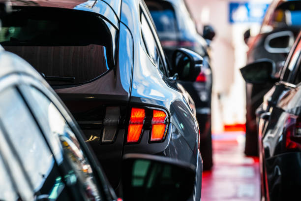 istock Brake lights on a car at a ferry car deck.. 2166911638