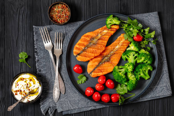 istock grilled salmon steaks with broccoli and tomatoes 2166913949