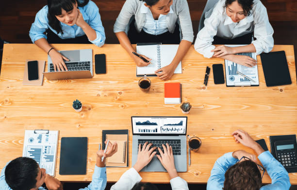 istock Panorama top view diverse analyst team analyzing financial data. Habiliment 2166913963